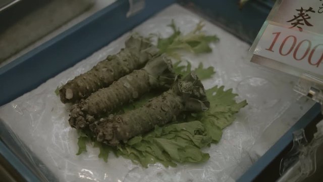wasabi fore sale at nishiki dori market in kyoto japan