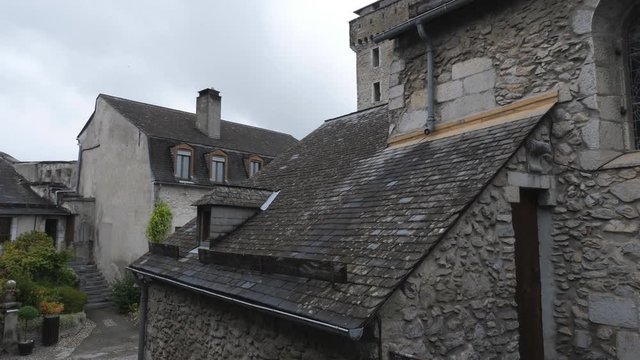 LOURDES, FRANCE on September 13th: Stone buildings inside the Chateau Fort de Lourdes in Lourdes, France on Sept 13th, 2018. Lourdes is a small market town in the foothills of the Pyrenees.