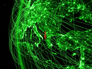 Albania from space on green model of Earth with international networks. Concept of green communication or travel.