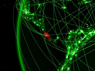 Costa Rica from space on green model of Earth with international networks. Concept of green communication or travel.