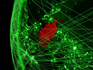 Afghanistan from space on green model of Earth with international networks. Concept of green communication or travel.
