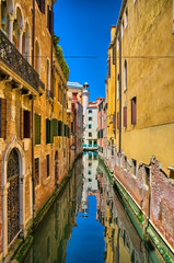 Fototapeta na wymiar Scenic canal on sunny day, Venice, Italy