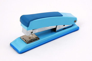 a stapler on a white background