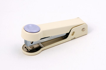 a stapler on a white background