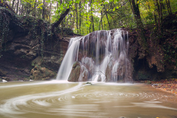 Altube waterfall in the Gorbea Natural Park, Basque Country, Spain. Long exposure in a cloudy day.