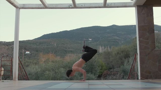 Handstand fitness press to bent arm planche to V-sit 4K scenic location