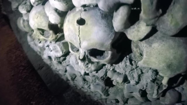 Closeup of stacks of skulls in Catacombs
