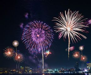 colorful fireworks on the black sky background with free space for text. Celebration and anniversary concept