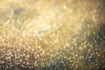 glitter gold bokeh Colorfull Blurred abstract background for birthday, anniversary, wedding, new year eve or Christmas
