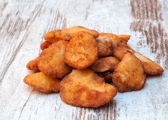 Pie meat surrounded by rustic background