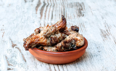 Chicken wings surrounded by rustic background