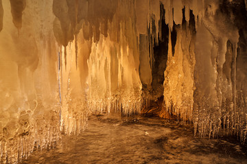 Icicles in the cave on the baikal