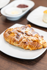 almonds croissants on plate