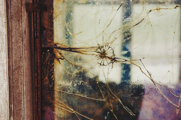 Old dirty cracked and broken window, Industrial background