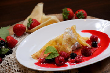 pancakes with berries and sugar