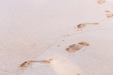 foots stamp on beach