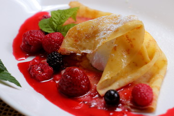 pancakes with berries and sugar