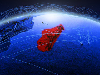 Madagascar on blue digital planet Earth with international network representing communication, travel and connections.