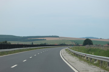 Fototapeta premium Empty highway road in the mountains, Hungary