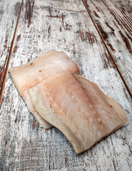 Cod pieces surrounded by rustic background