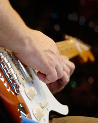 guitarist plays guitar