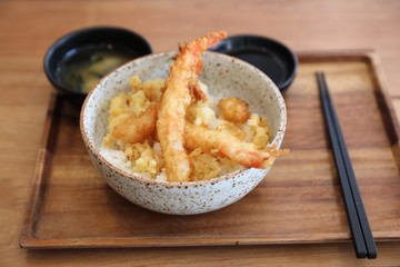 Tempura donburi , Fried shrimp tempura on rice japanese food on wooden table