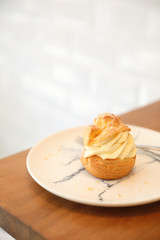 choux cream on wooden table
