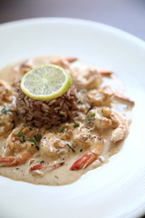 Grilled prawns shrimps with garlic, lemon and spices with rice