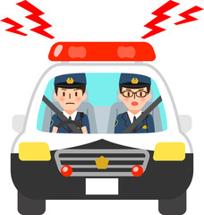 サイレンを鳴らすパトカーに乗った警察官 © logistock
