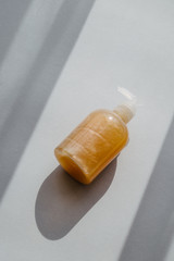 Organic scented soy candle on white. Loft interior decor, minimalism concept.  Closeup, copy space for text