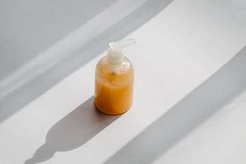 Organic scented soy candle on white. Loft interior decor, minimalism concept.  Closeup, copy space for text