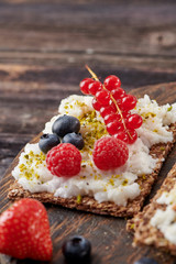 Sandwich with nuts and berrie Useful breakfast.