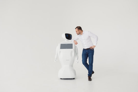 Humanoid autonomous robot with stylish man in a suit. Modern Robotic Technologies. Humanoid autonomous robot. white background
