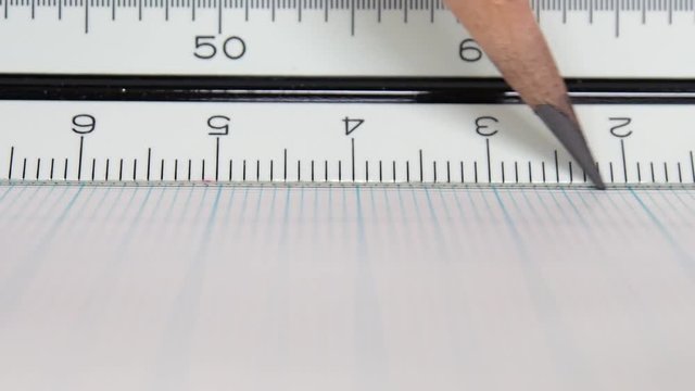 三角スケールと鉛筆　方眼紙　製図イメージ