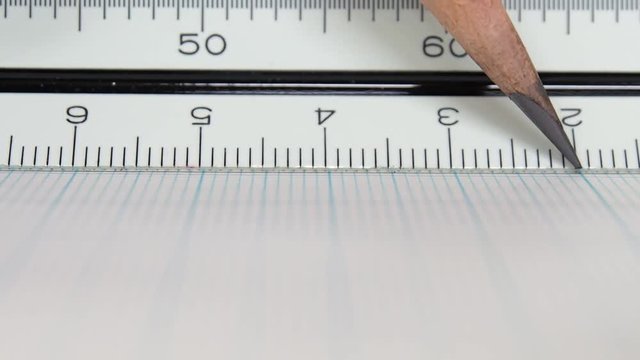 三角スケールと鉛筆　方眼紙　製図イメージ
