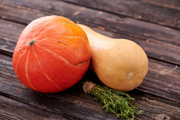 pumpkins on dark wooden background