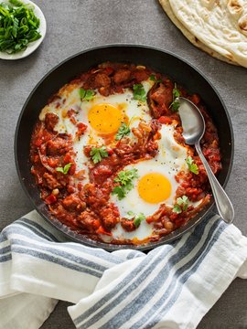 Shakshuka (poached eggs in tomato sauce, North Africa)