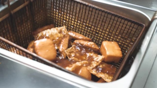 chef frying tofu