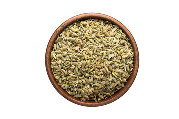 anise seeds spice in wooden bowl, isolated on white background. Seasoning top view