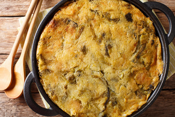 English vegetarian Bubble & Squeak of potatoes with cabbage and brussels sprouts close-up in a pan. horizontal top view