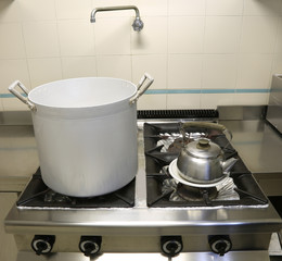 large aluminum pot with a teapot