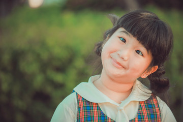 Fototapeta premium Little girl making a funny face