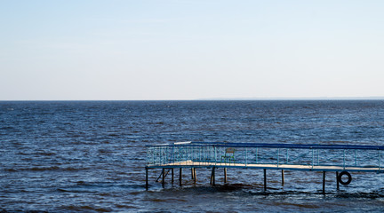 Water surface with wharf on Kyiv Sea, autumn