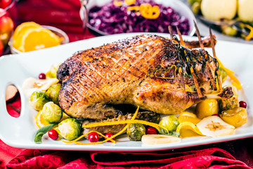 Christmas roast duck served on a festive table