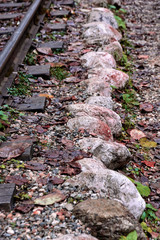 Fragment of an old railway paved with stones