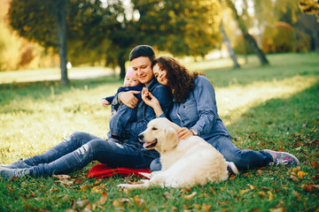 Fototapeta premium Beautiful family in a park