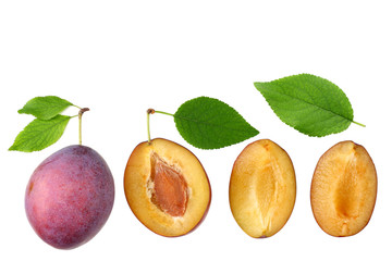 fresh plum fruit with green leaf and cut plum slices isolated on white background. top view