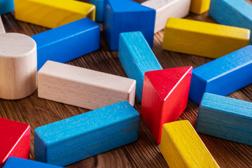Abstract Background. Background with different colorful shapes wooden blocks.