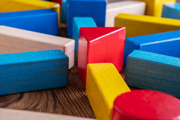 Abstract Background. Background with different colorful shapes wooden blocks.