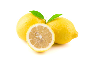 Yellow Lemon citrus half slices with leaf isolated on white background with clipping path